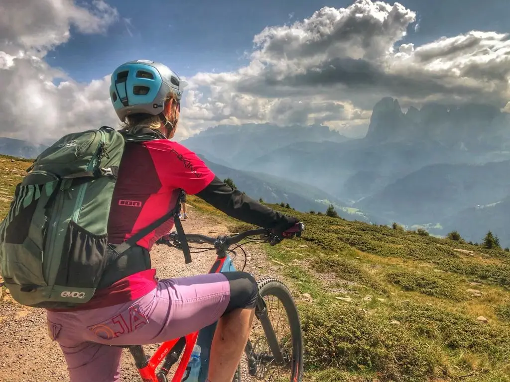 Rider looking out over the Dolomites
